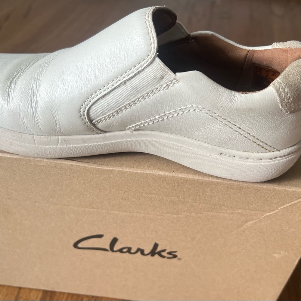 Clarks Cream Slip-On Shoes
